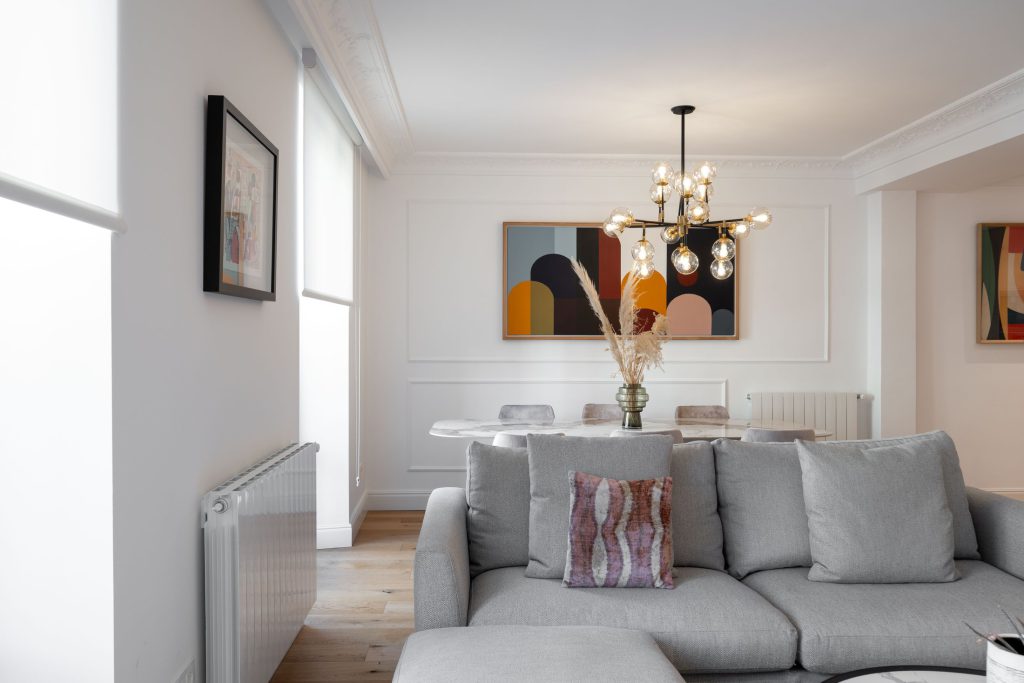 Sunlit living and dining room at Cathedral Prestige Suite