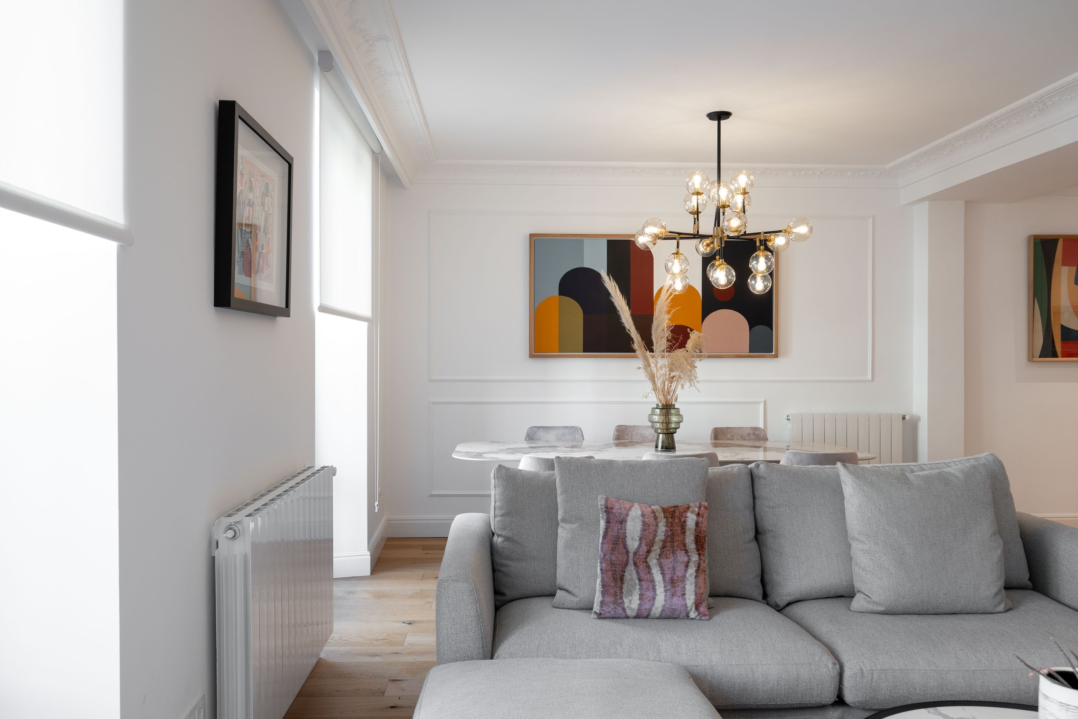 Sunlit living and dining room at Cathedral Prestige Suite